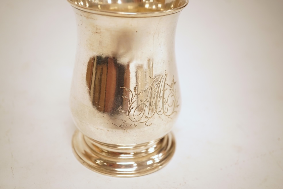 A George III silver baluster mug, by John Payne, London, 1771, height 10.2cm, 7oz.